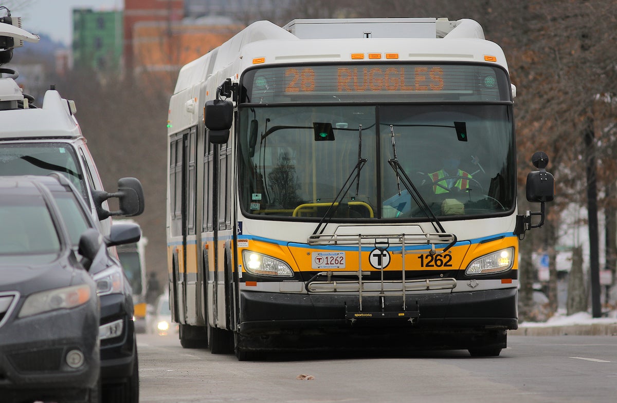 Boston, MA - 03/01/22 - A 28 bus heads inbound to Ruggles Station on Blue Hill Avenue. Riders took advantage of the start of a new two-year program that makes MBTA bus lines 23, 28, and 29 all free of charge. (Lane Turner/Globe Staff) Reporter: (Taylor Dolven) Topic: (02wu)