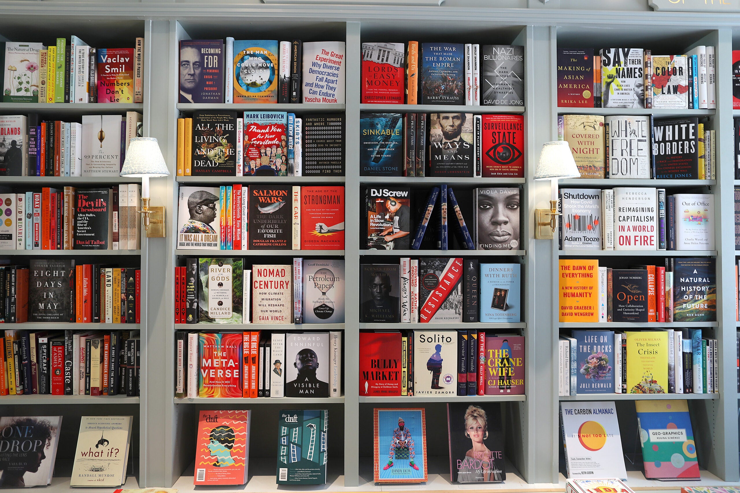 alt = bookshelves at The Beacon Hill Books & Cafe on Charles Street in Beacon Hill.