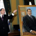 alt = Former Massachusetts Senate President Thomas Birmingham of Chelsea, Mass. gestures as he unveils his official portrait at the Statehouse in Boston Thursday, May 12, 2011.