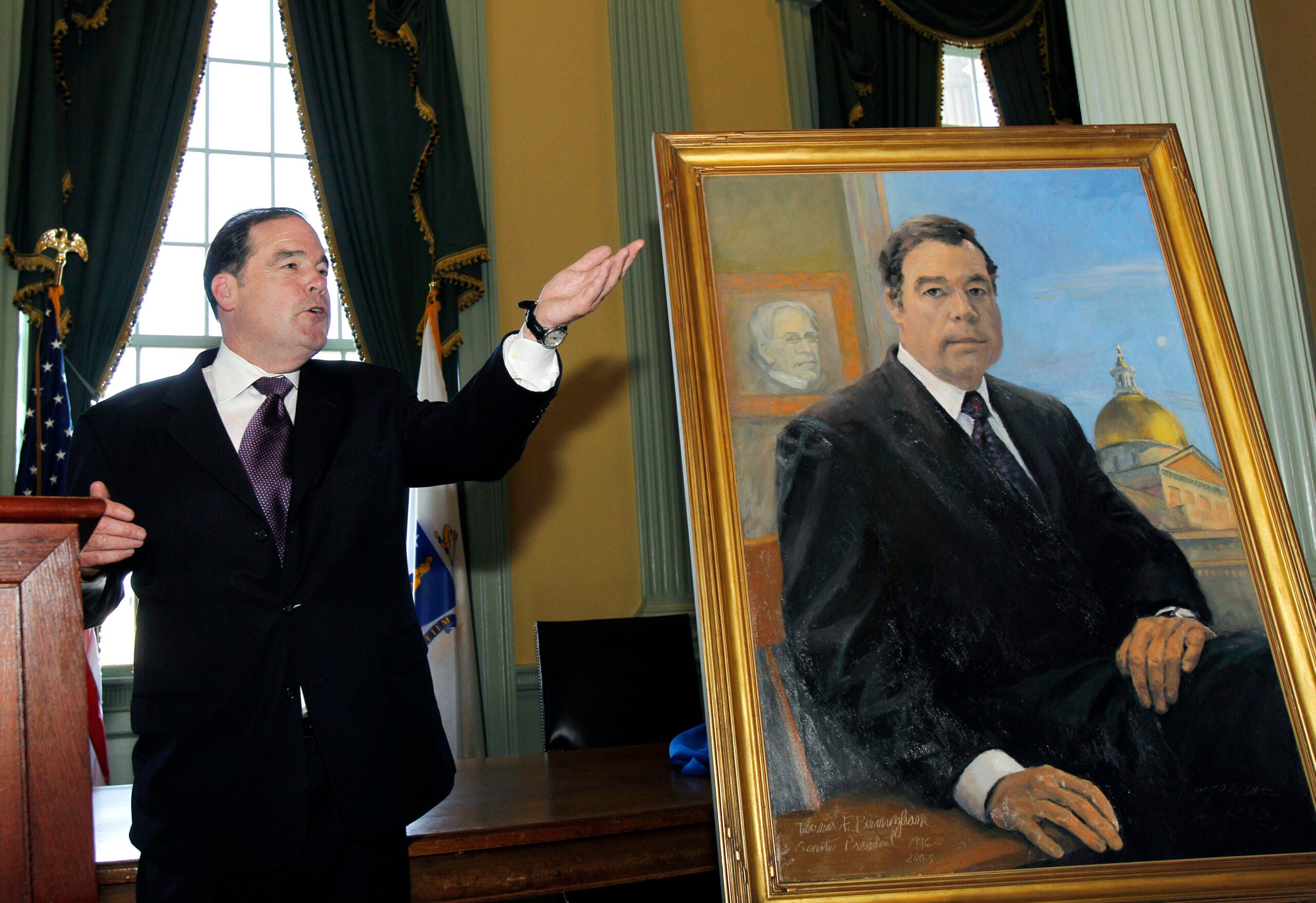 alt = Former Massachusetts Senate President Thomas Birmingham of Chelsea, Mass. gestures as he unveils his official portrait at the Statehouse in Boston Thursday, May 12, 2011.