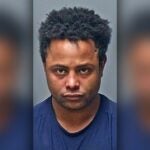 alt = Murtadah Mohammad, 25, wearing a dark blue shirt in a mugshot released by police.