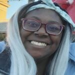 alt = Manchester, New Hampshire police are looking for 17-year-old Lorraine Springer-Aidoo, who has long white and black hair, red-rimmed glasses, and was last seen carrying a red backpack and a dark-colored jacket.