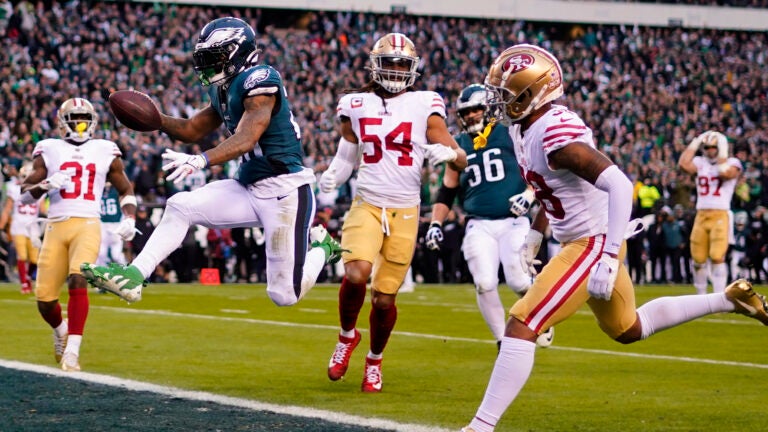 Philadelphia running back Miles Sanders celebrates after scoring during the first half of the NFC Championship game between the Eagles and the San Francisco 49ers in Philadelphia.
