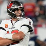 Tampa Bay Buccaneers quarterback Tom Brady (12) stands on the field during the second half of an NFL wild-card football game against the Dallas Cowboys, Monday, Jan. 16, 2023, in Tampa, Fla.