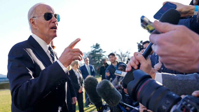President Joe Biden talks with reporters on the South Lawn of the White House in Washington, Monday, Jan. 30, 2023, after returning from an event in Baltimore on infrastructure. (AP Photo/Susan Walsh)
