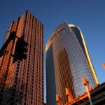 The Sudbury and One Congress buildings in Boston during a winter morning sunrise.