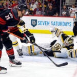 Carolina Hurricanes' Paul Stastny (26) shoots the puck past Boston Bruins goaltender Linus Ullmark, front right, for a goal during the second period of an NHL hockey game in Raleigh, N.C., Sunday, Jan. 29, 2023.