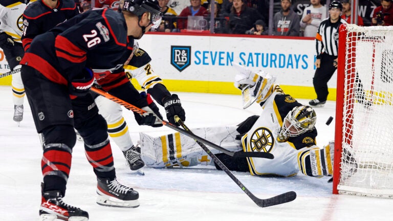Carolina Hurricanes' Paul Stastny (26) shoots the puck past Boston Bruins goaltender Linus Ullmark, front right, for a goal during the second period of an NHL hockey game in Raleigh, N.C., Sunday, Jan. 29, 2023.