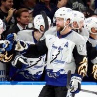 Tampa Bay's Victor Hedman celebrates with the bench after scoring during the third period.