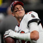 Tampa Bay Buccaneers quarterback Tom Brady (12) is shown before an NFL football game against the Atlanta Falcons Sunday, Jan. 8, 2023, in Atlanta.