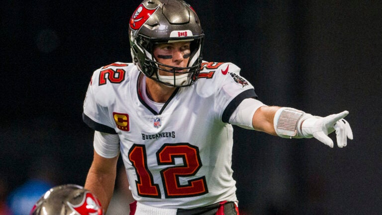 Tampa Bay Buccaneers quarterback Tom Brady (12) points during the first half of an NFL football game against the Atlanta Falcons, Sunday, Jan. 8, 2023, in Atlanta. The Atlanta Falcons won 30-17.