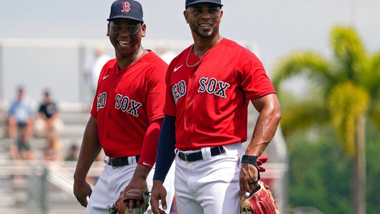 Red Sox 3B Devers practices with teammates on, off field