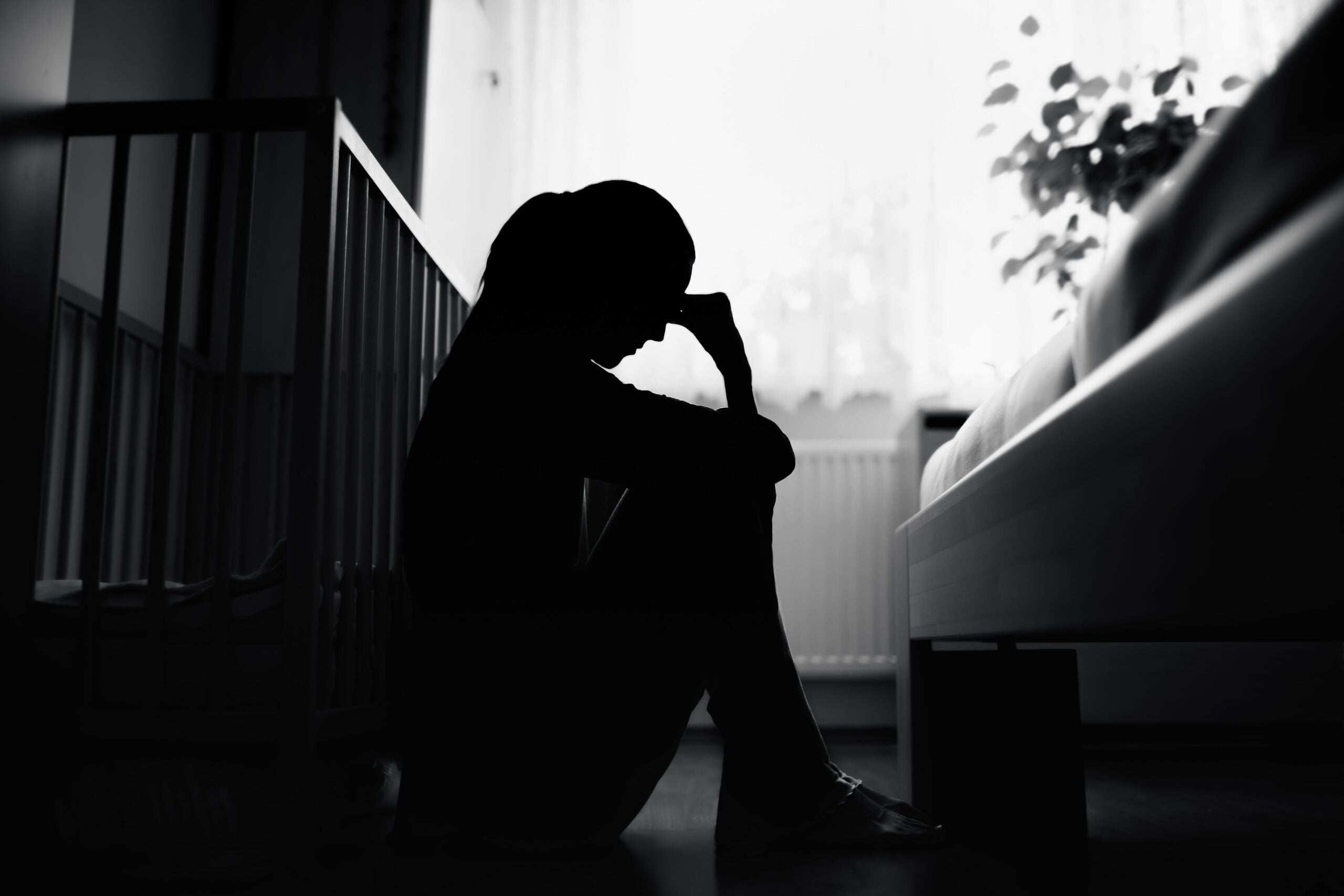 A photo depicting postpartum depression