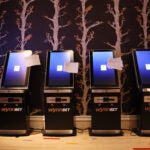 A view of kiosks set up inside Encore casino ahead of the launch of sports betting in Massachusetts.