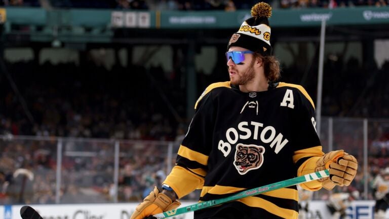 David Pastrnak #88 of the Boston Bruins warms up prior to a game against the Pittsburgh Penguins in the 2023 Discover NHL Winter Classic at Fenway Park on January 02, 2023 in Boston, Massachusetts.