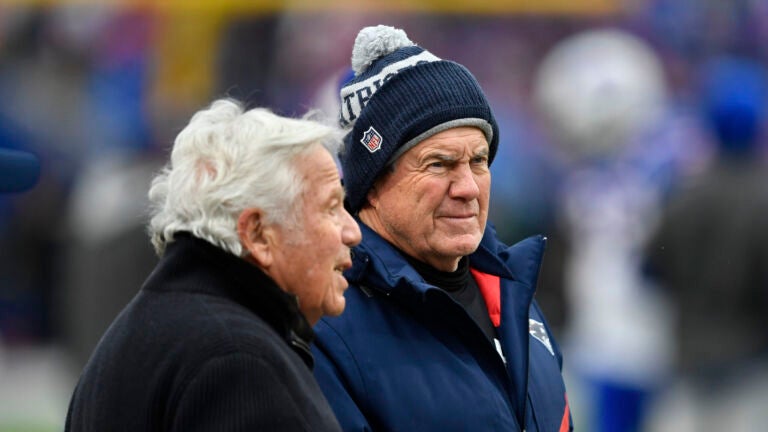 New England Patriots head coach Bill Belichick meets with Patriots owner Robert Kraft, left, before an NFL football game against the Buffalo Bills, Sunday, Jan. 8, 2023, in Orchard Park, N.Y.