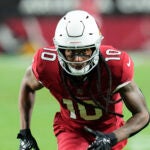 Arizona Cardinals wide receiver DeAndre Hopkins runs down field against the New England Patriots during the first half of an NFL football game in Glendale, Ariz., Monday, Dec. 12, 2022.