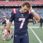 New England Patriots punter Jake Bailey (7) walks onto the field following an NFL football game against the Baltimore Ravens, Sunday, Sep. 25, 2022, in Foxborough, Mass.