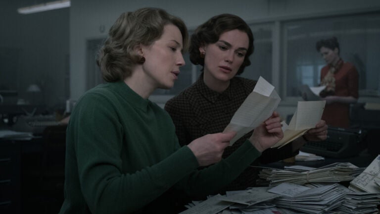 Carrie Coon (L) as Jean Cole and Keira Knightley (R) as Loretta McLaughlin in "Boston Strangler."