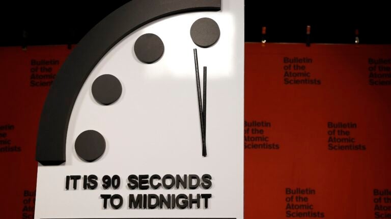 alt = the 2023 Doomsday Clock is set at 90 seconds to midnight.