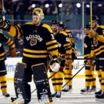 Boston Bruins' Linus Ullmark (35) and teammates celebrate after defeating the Pittsburgh Penguins in the NHL Winter Classic hockey game, Monday, Jan. 2, 2023, at Fenway Park in Boston.