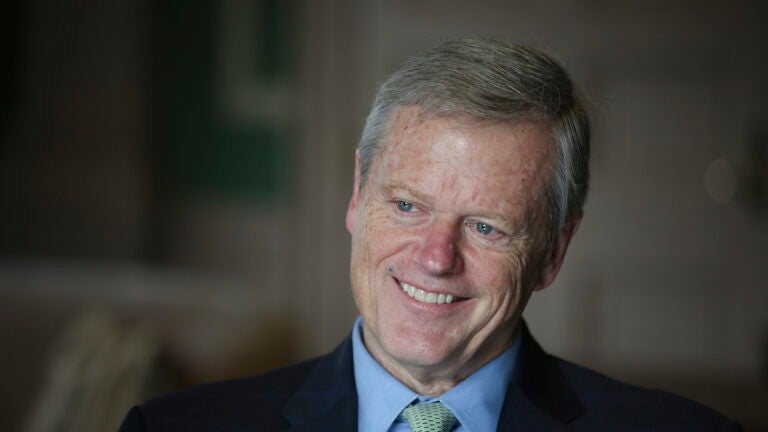 Massachusetts Governor Charlie Baker speaks during an interview at the Massachusetts State House, Dec. 27, 2022, in Boston.