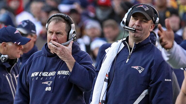 atriots quarterback Tom Brady (12) walks towards the bench as head coach Bill Belichick (center) and offensive coordinator Bill O'Brien (right) watch. he New England Patriots visited the Washington Redskins in an NFL regular season game at FedEx Field.