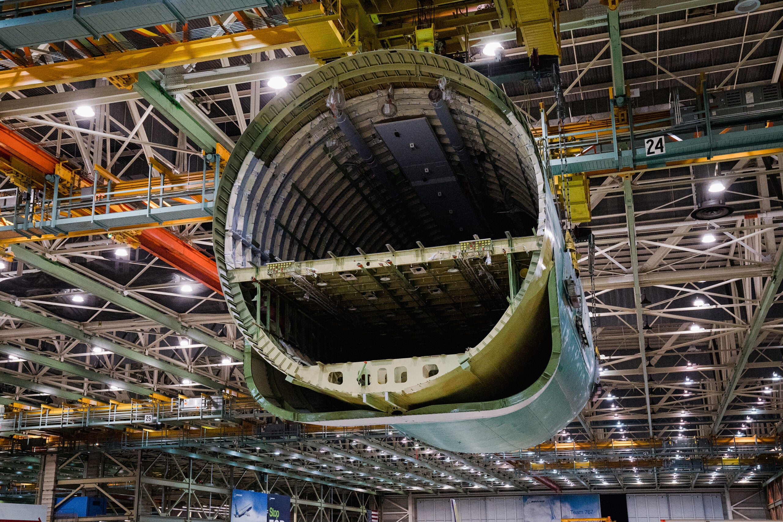 Cranes lift the rear fuselage during the final body join.