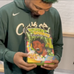 Marcus Smart holding his cereal box