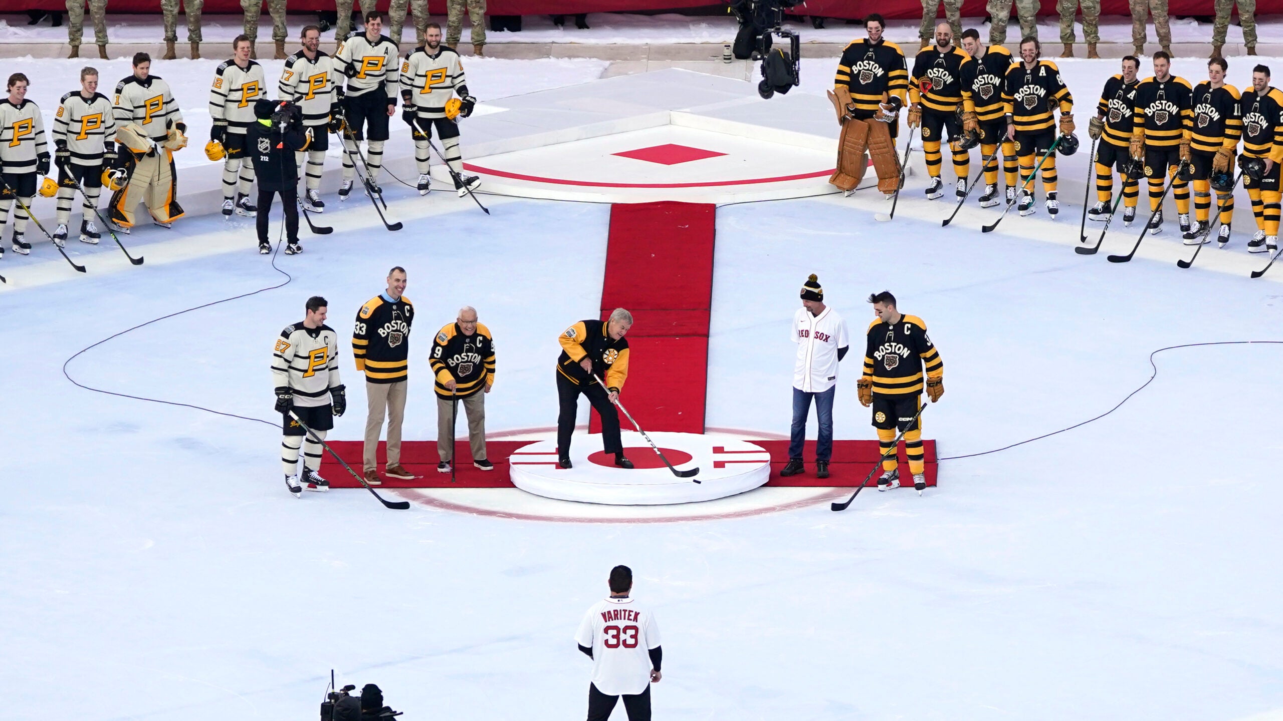 Bruins players sport vintage Red Sox uniforms as Fenway Park