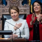 Gov. Maura Healey greets onlookers after she is sworn into office on Thursday as Massachusetts’ 73rd governor, making history as the first woman ever elected to the post here and one of the nation’s first openly lesbian governors.