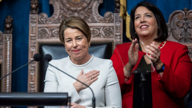 Gov. Maura Healey greets onlookers after she is sworn into office on Thursday as Massachusetts’ 73rd governor, making history as the first woman ever elected to the post here and one of the nation’s first openly lesbian governors.