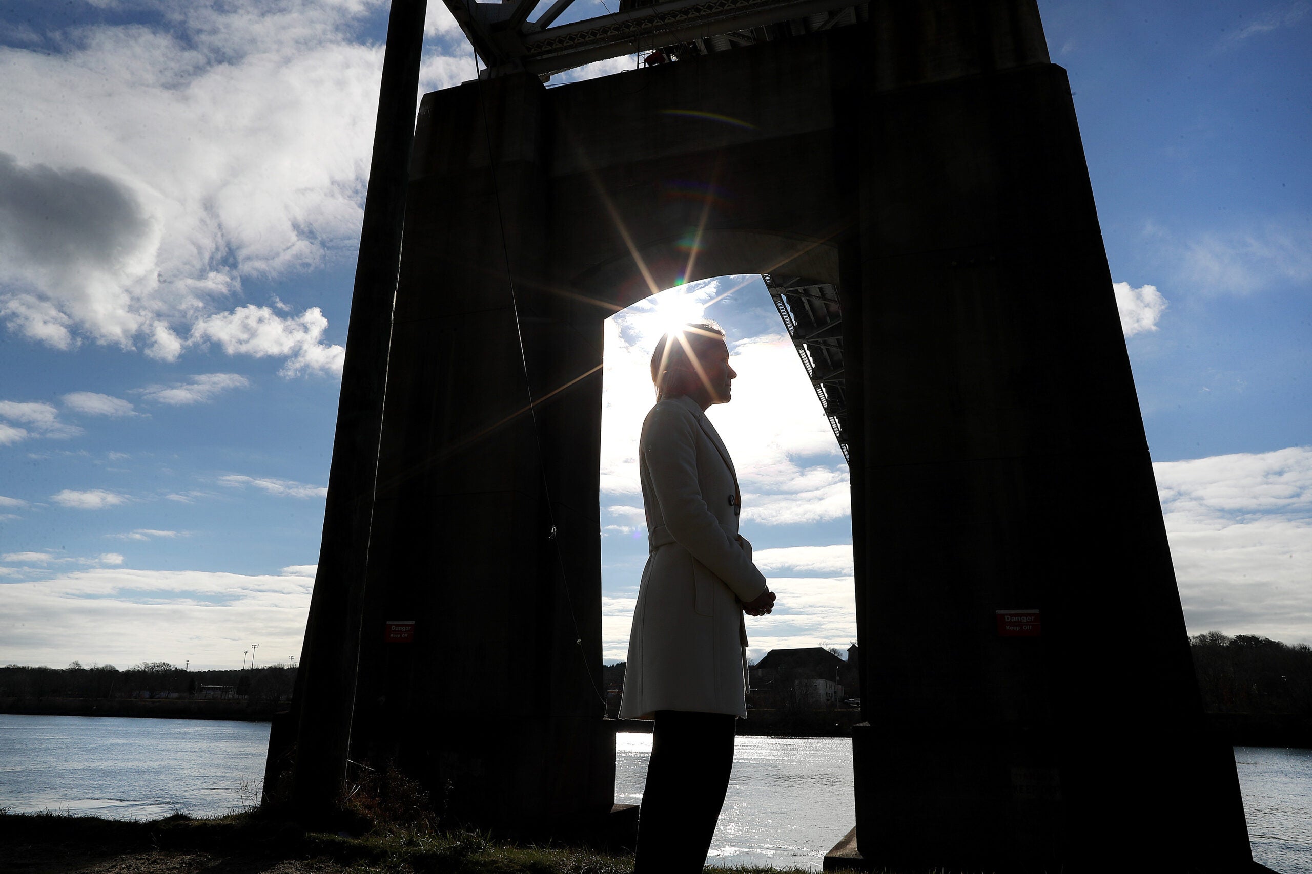 Kristy Senatori, Executive Director of the Cape Cod Commission surveyed underneath the Sagamore Bridge.
