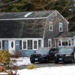 Duxbury police parked outside Lindsay Clancy's home on Wednesday.