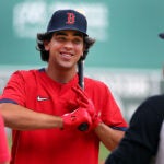 The Sox first-round draft pick, Marcelo Mayer took fielding and batting practice before the game. He chats with Alex Verdugo.