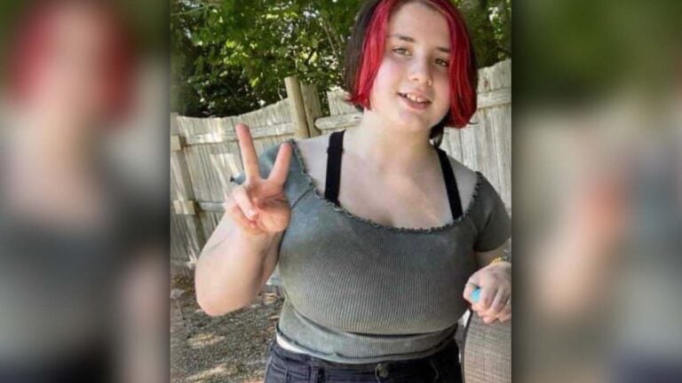 alt = Kayleigh "Kie" McCormack, 13, has brown hair with red streaks in the front and blue eyes. She is approximately 5 feet, 2 inches tall and weighs about 130 pounds.