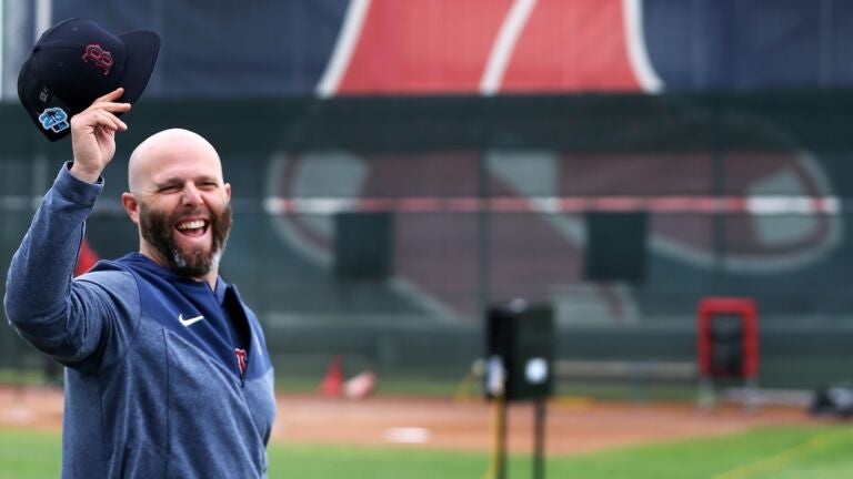 Dustin Pedroia helps out at Red Sox spring training