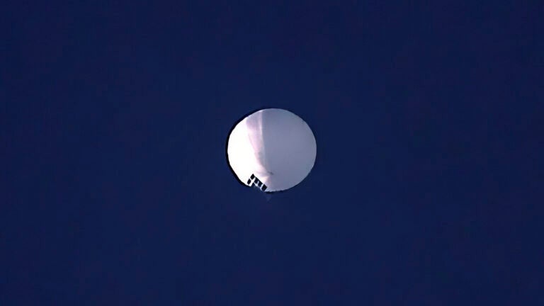A high altitude balloon floats over Billings, Mont., on Wednesday, Feb. 1, 2023. The U.S. is tracking a suspected Chinese surveillance balloon that has been spotted over U.S. airspace for a couple days, but the Pentagon decided not to shoot it down due to risks of harm for people on the ground, officials said Thursday, Feb. 2, 2023. The Pentagon would not confirm that the balloon in the photo was the surveillance balloon.