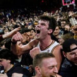 Boston College celebrates in victory over No. 6 Virginia.