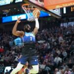Team LeBron guard Jaylen Brown (7) shoots during the second half of the NBA basketball All-Star game Sunday, Feb. 19, 2023, in Salt Lake City.