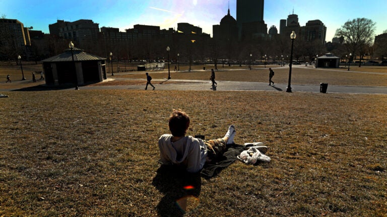 Enjoying mild February temperatures on the Boston Common.