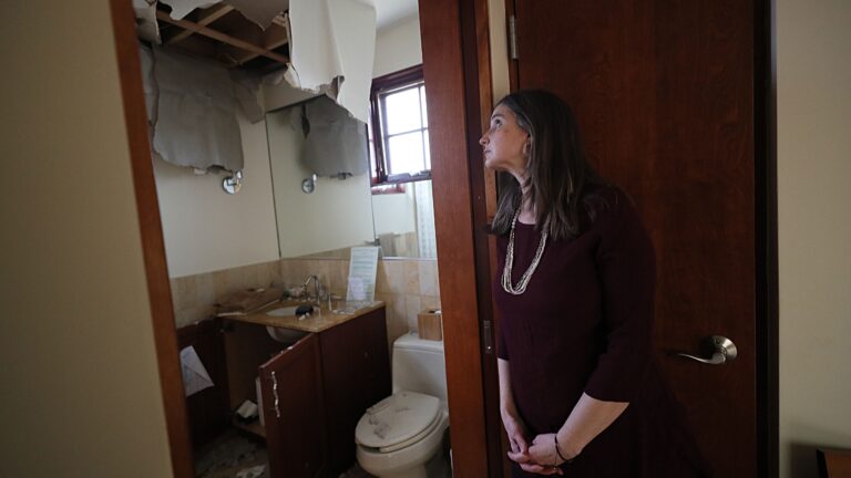Carrie Bornstein, CEO of Mayyim Hayyim, shows the damage to the well-known Jewish learning and spirituality center suffered severe weather-related damage over the weekend.