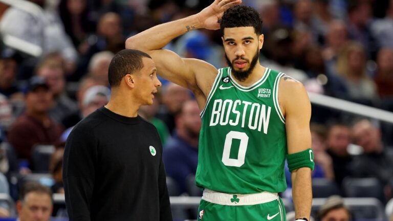 Celtics head coach Joe Mazzulla with Jayson Tatum.