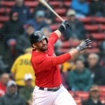Red Sox DH J.D. Martinez watches the flight of his first inning home run. The Boston Red Sox hosted the Tampa Bay Rays in their final MLB baseball game of the season at Fenway Park.