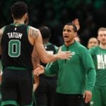 Boston Celtics head coach Joe Mazzulla celebrates with Jayson Tatum #0 during the game against the Phoenix Suns at TD Garden on February 03, 2023 in Boston, Massachusetts.