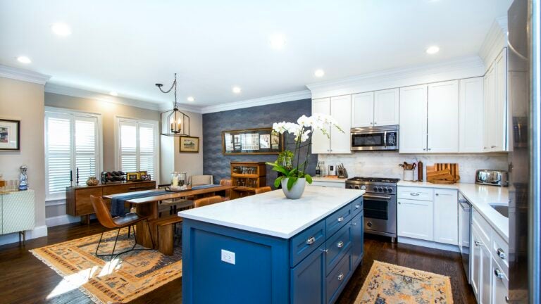 A Home of the Week kitchen with blue cabinetry.