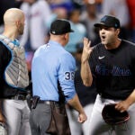 Catcher Jacob Stallings looks on as Richard Bleier of Miami angrily reacts after being called for three balks during the eighth inning on Sept. 27, 2022, against the Mets.