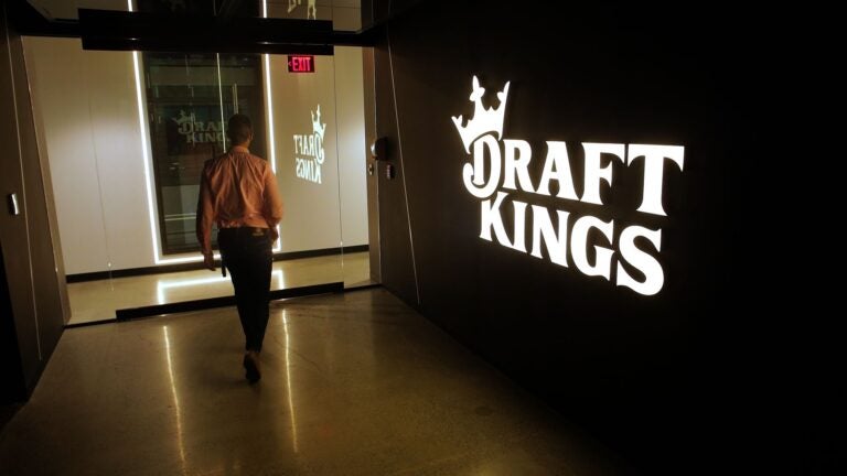A DraftKings employee in the lobby of its Back Bay offices.