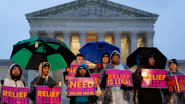 Student debt relief advocates gather outside the Supreme Court on Capitol Hill in Washington, Monday, Feb. 27.