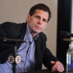 General Manager of the Boston Bruins Don Sweeney talks to reporters during Media Day at Warrior Arena.